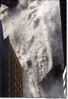 World_Trade_Center_-_Debris_fills_the_sky_as_a_tower_collaps.jpg