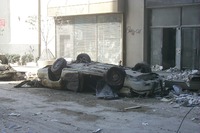 09-12-01_Upside_Down_NYPD_Car_on_Cortland_near_Church.JPG